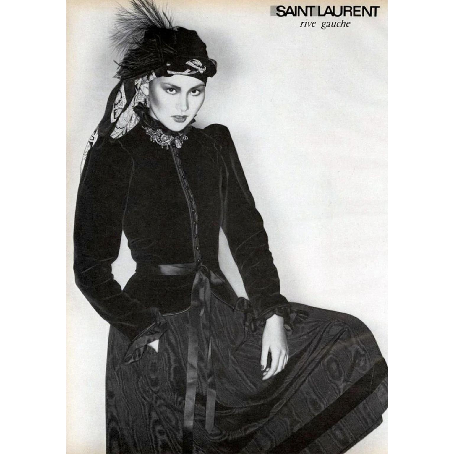This is an iconic vintage Yves Saint Laurent chocolate brown velvet jacket with black taffeta ruffle trim from the YSL Fall/Winter 1976/77 ready to wear collection which was inspired by the Yves Saint Laurent Haute Couture Russian 