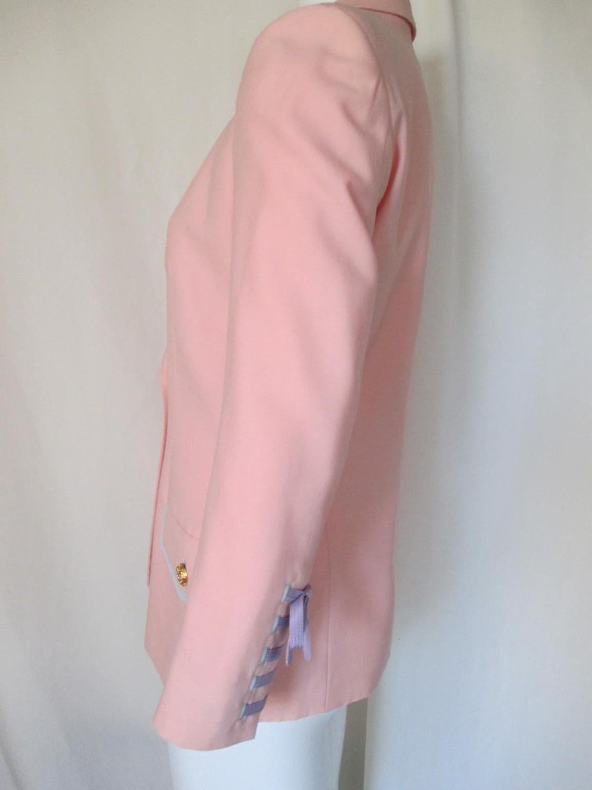 COLLECTORS ITEM- documented
An iconic Gianni Versace Couture jacket from spring 1992 ready to wear show, one of Versace's most important and sought after collections.

Material: 15 % silk/ 85% linen 
Color: salmon/pink with blue and yellow details
