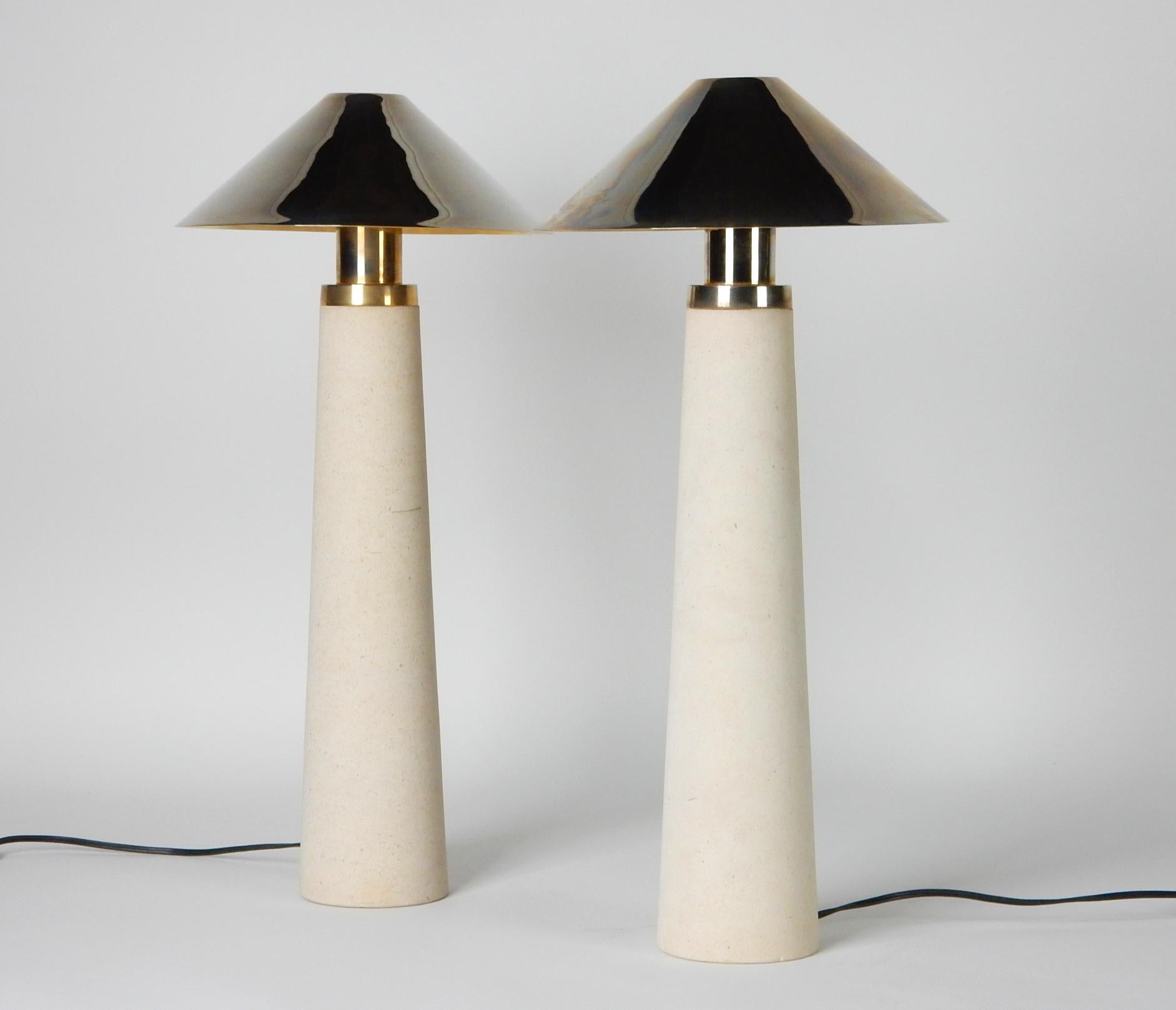 Amazing pair of stone, brass and chrome table lamps by Karl Springer.
Brass tone top cap. Brass underside of shade with mirror chrome finish on top, circa 1980s.
Mood lamps with dimmer switch in cord. Requires a single candle bulb. 
  