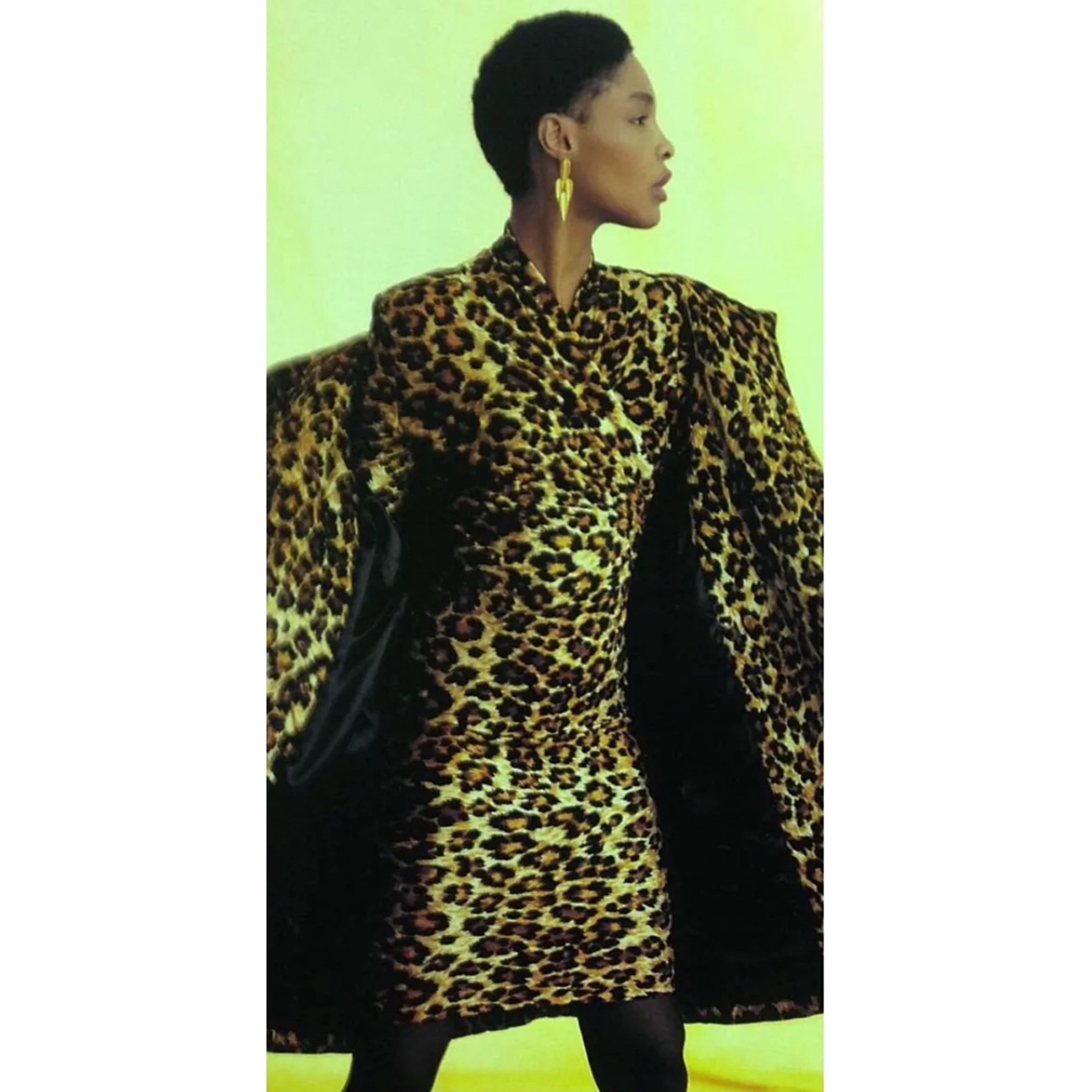 Rare documented PATRICK KELLY Fall 1989 leopard cheetah animal print velour bodycon dress ! Faux wrap style slips over the head with hidden zipper up the back and hook-and-eye closure. Soft velour fabric offers plenty of stretch. 
Perfect for any