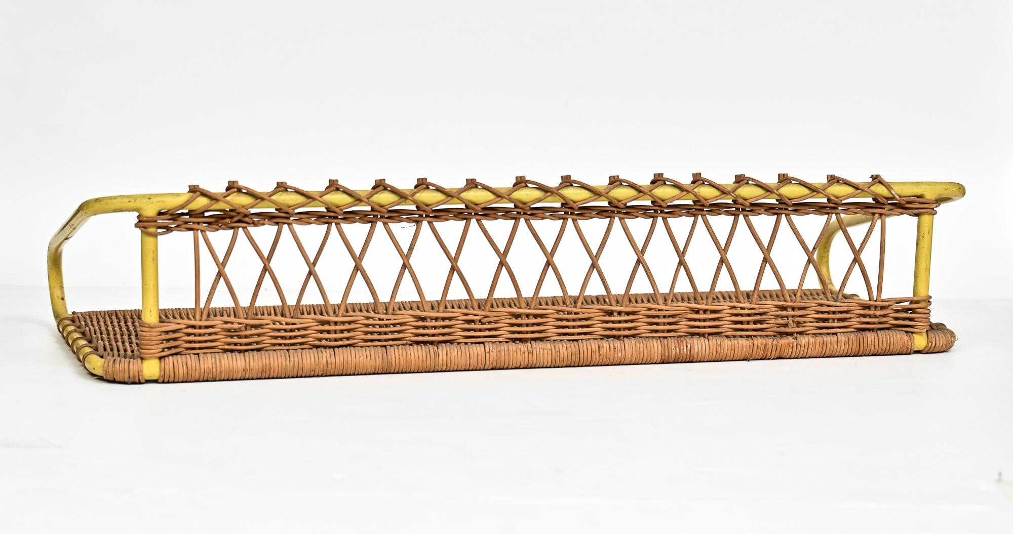 Yellow painted steel and rattan wall shelf designed by Raoul Guys in exceptional original condition

Manufactured by Airborne

France circa 1950

Similar example can be found in 

Mobilier Decoration No 5 1953