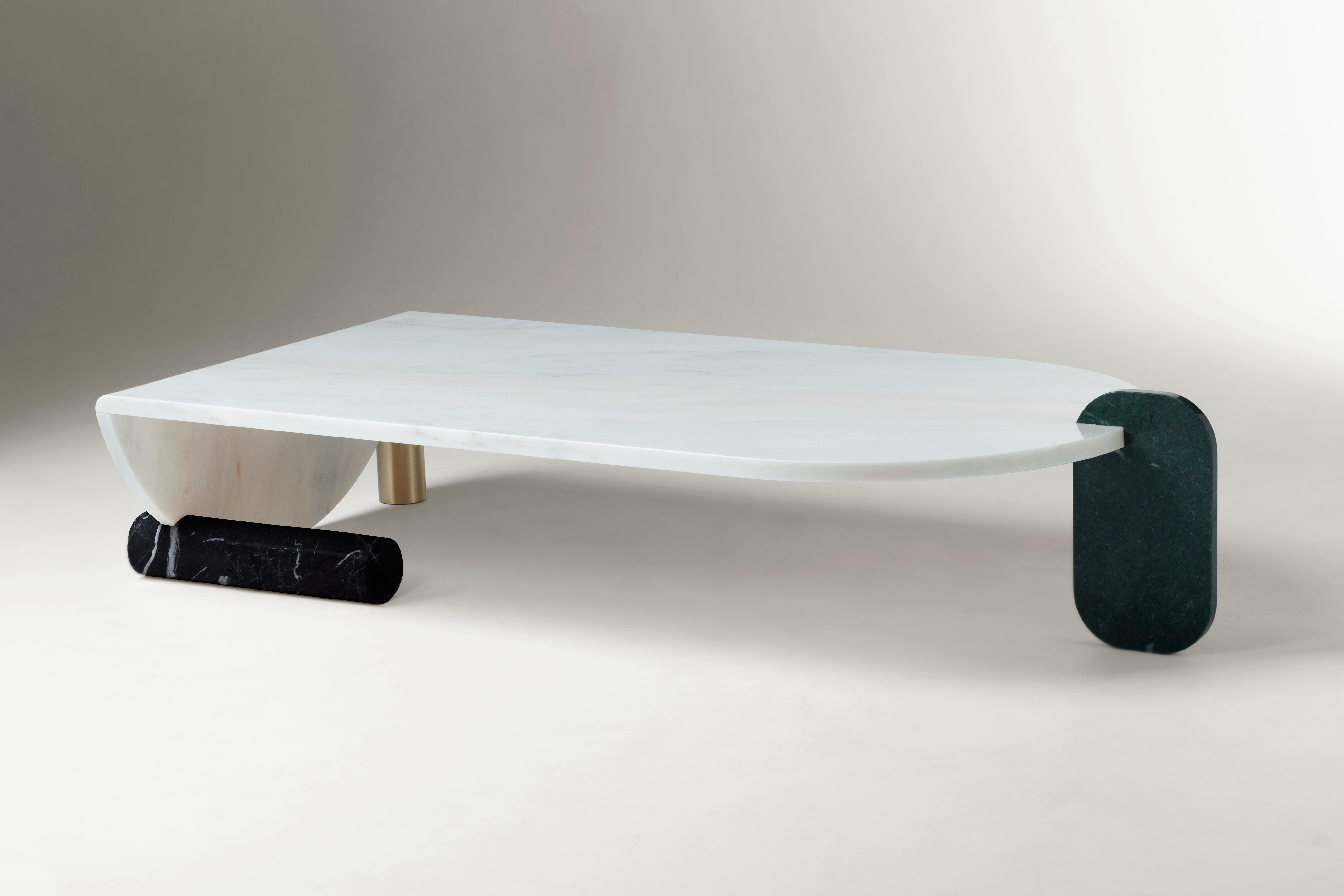 The geometrical shapes of these tables play between them in a game of proportion and color which results in the creation of a perfect balance and tension of material and negative space. The absence of figurative shapes allows this table to look