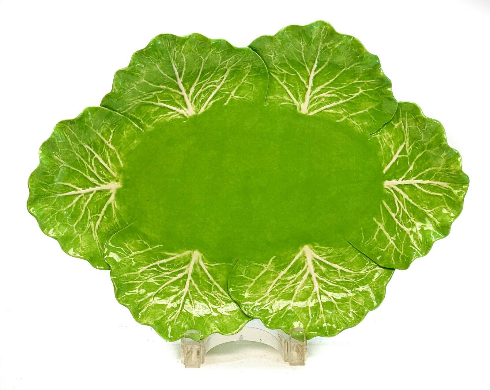 Dodie Thayer Jupiter lettuce leaf handmade earthenware tray. Dodie Thayer Jupiter marks to the underside. 

Weight Approx., 2 lbs

Measures Approx., 14.125 inches x 9.75 inches x 1.75 inches.