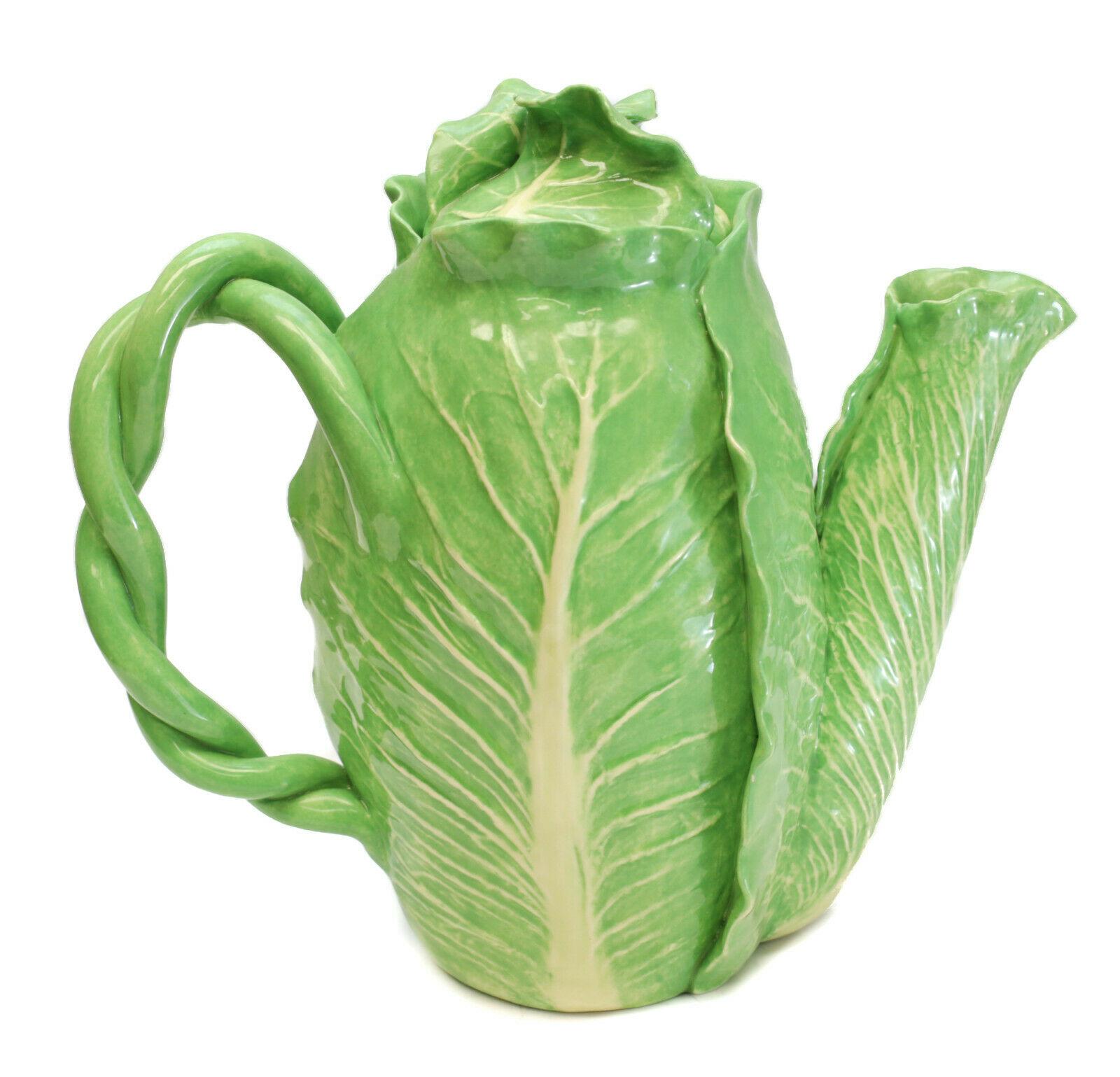 Dodie Thayer lettuce leaf ware Au Bon Gout porcelain teapot, circa 1985. Twisted stem handle. Dodie Thayer Au Bon Gout mark to the underside.