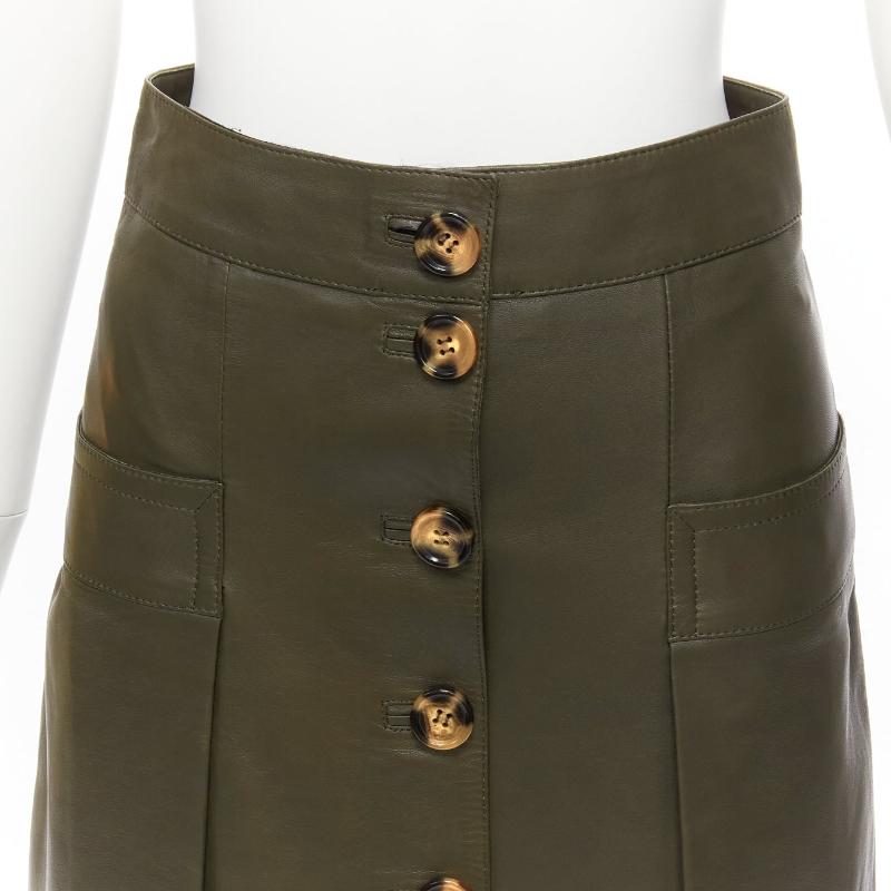 DODO BAR OR dark green genuine leather shell button pocketed pleated skirt IT40 S
Reference: SNKO/A00414
Brand: Dodo Bar Or
Material: Leather
Color: Green
Pattern: Solid
Closure: Button
Lining: Green Fabric
Made in: Turkey

CONDITION:
Condition: