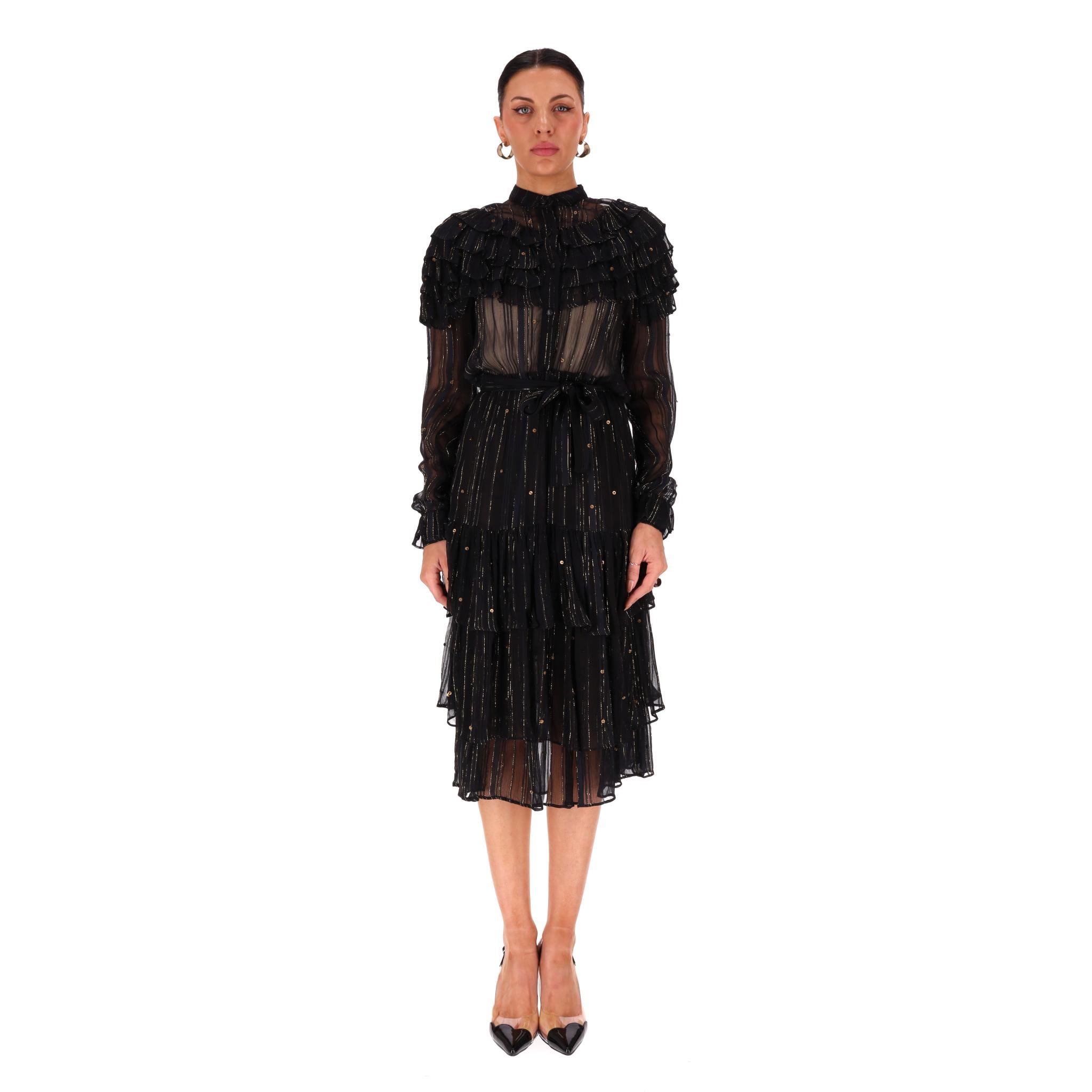 Dodo Bar Or Tiered Embellished Lace Dress

Black midi dress accented with gold threaded design and sheer panel to the centre and sleeves.

All-over gold stud embellishment and ruffle detailing to the chest and shoulders.

Elasticated waist, buttoned