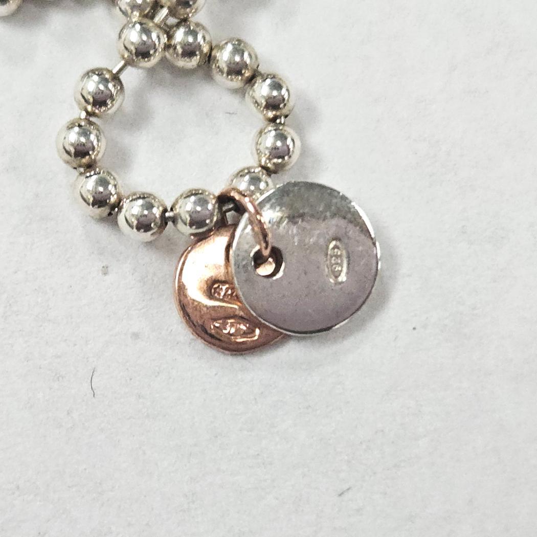 Dodo by Pomellato Bollicine Collana a Lariat in argento sterling e oro rosa 9k In condizioni ottime in vendita a North Miami, FL