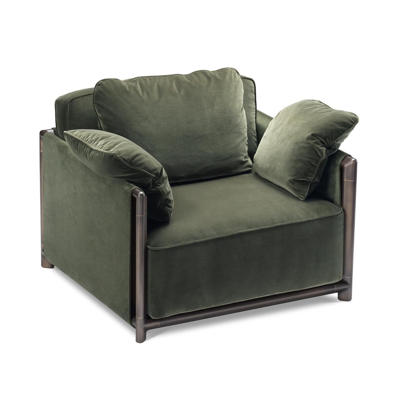 Ideal to be paired with its sofa counterpart for a cohesive look, this armchair couples neat lines to generous volumes to provide excellent comfort without renouncing sober elegance, Fluffy cushions covered in soft, green fabric comprise the seat,