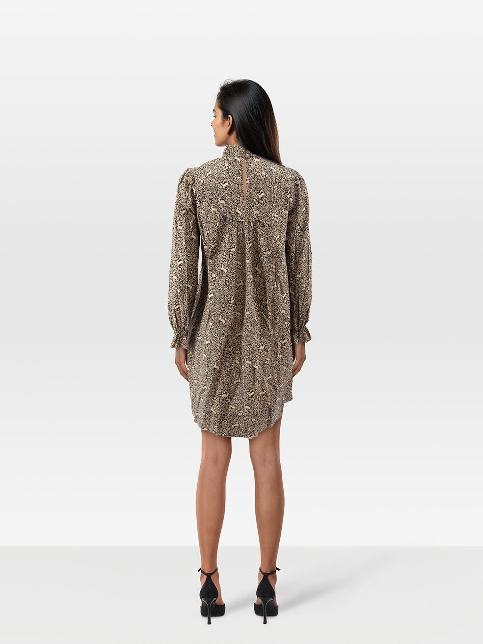 CONDITION is Very Good. Hardly any visible wear to dress is evident on this used DÔEN designer resale item.
 
 
 
 Details
 
 
 Brown
 
 Cotton
 
 Dress
 
 Deer print
 
 Long sleeves
 
 Mini length
 
 Button up fastening
 
 Ruffle neckline
 
 
 
 
