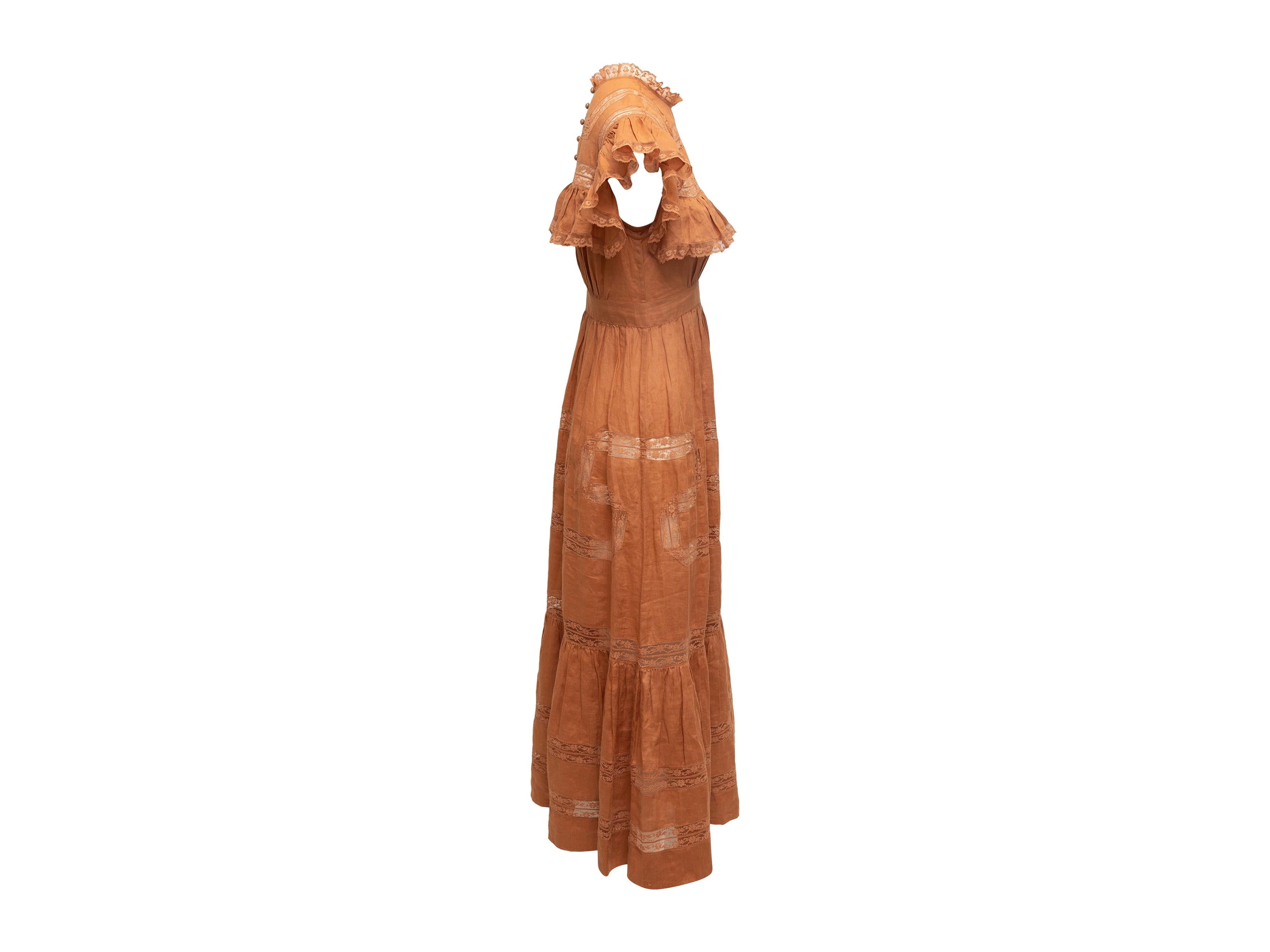 Product details: Tan lace-trimmed maxi prairie dress by Doen. Crew neck. Short sleeves. Buttons at nape. Zip closure at side. 30