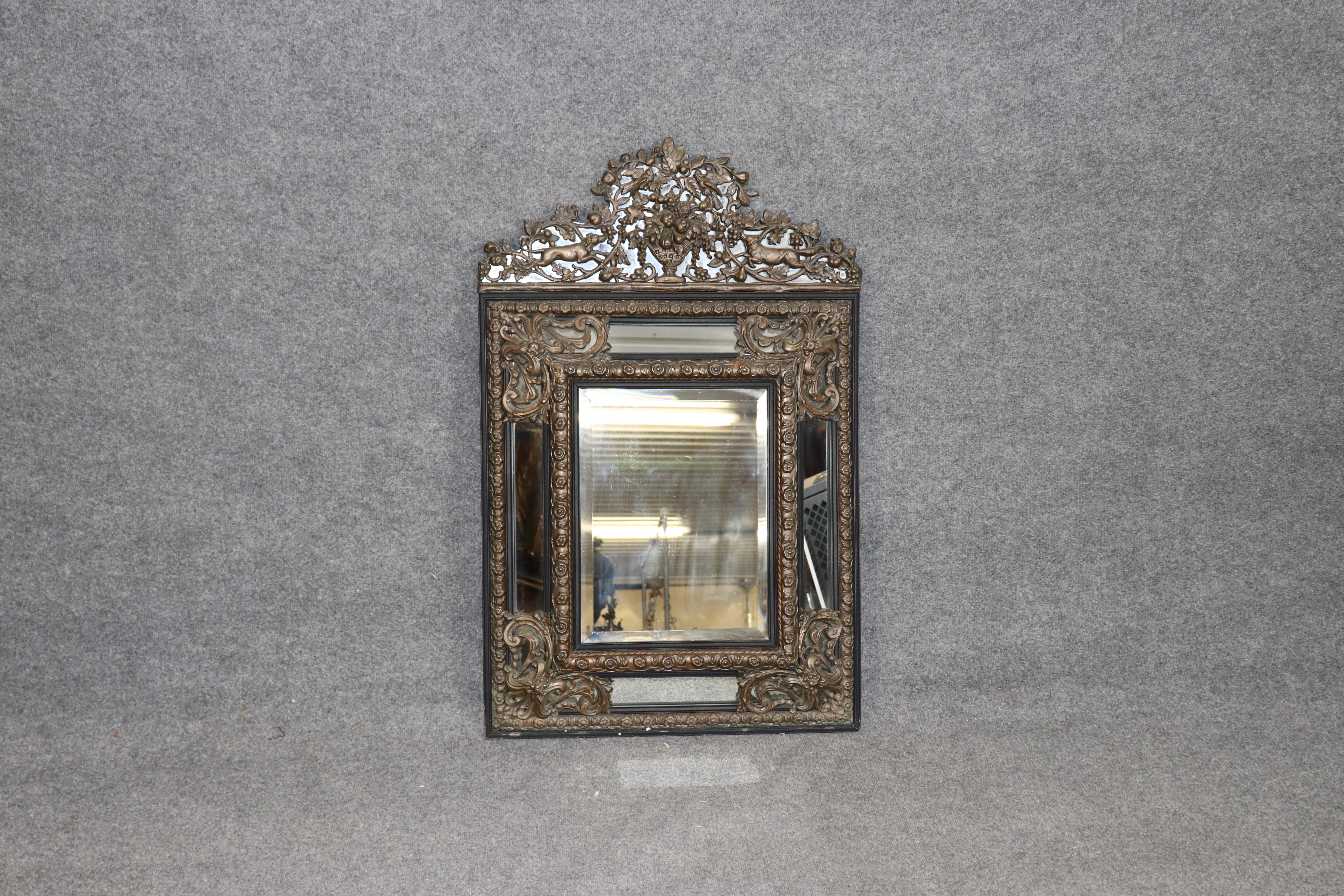 **Antique French Brass Repousse and Beveled Glass Mirror with Fruit, Dog, and Fox Motif – Circa 1890–1900**

This magnificent **French brass repousse mirror** from the **late 19th to early 20th century (circa 1890–1900)** is an exquisite example of
