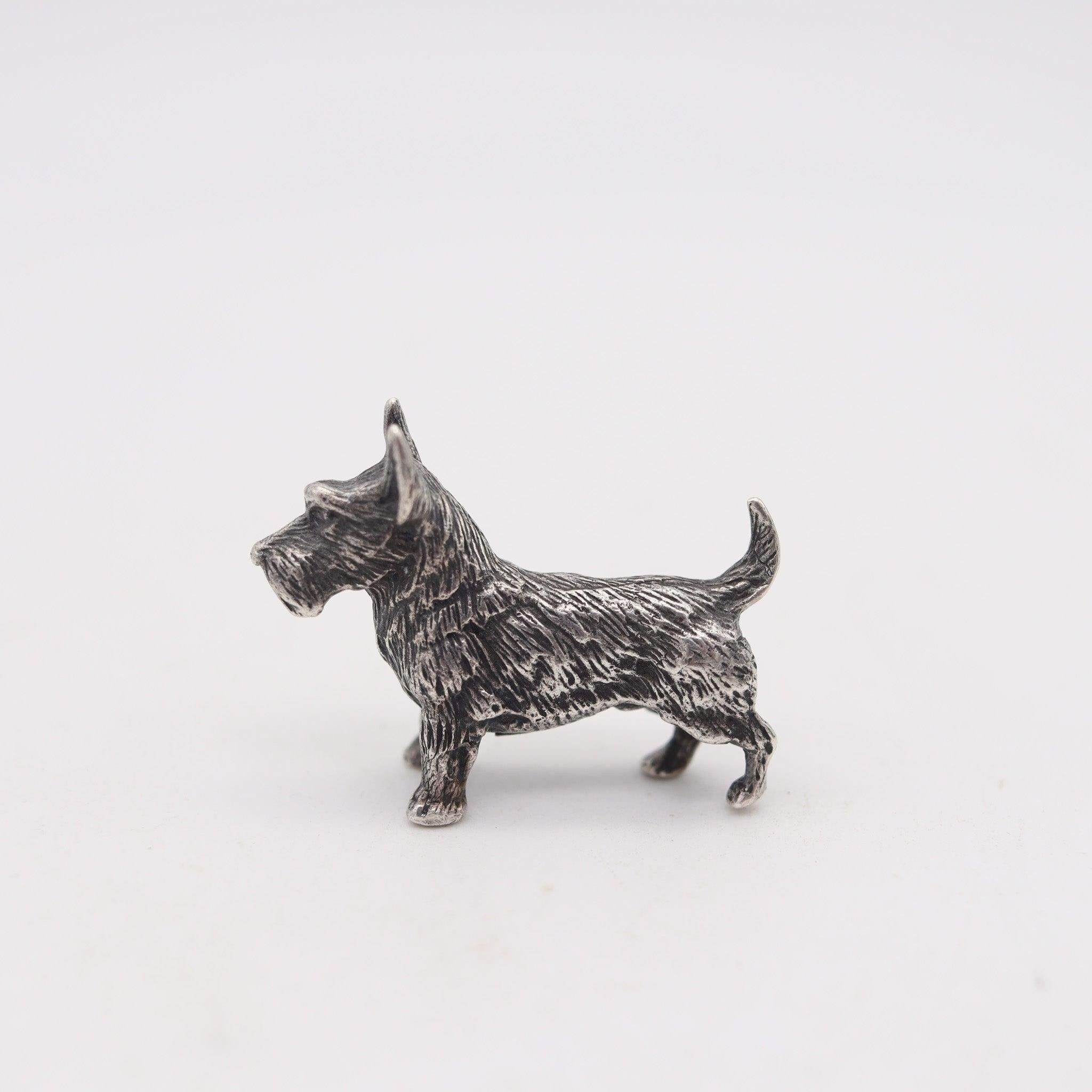 Figurine of a dog in solid sterling.

This is a beautiful and very well made figurine of a standing dog created in Firenze Italy, back in 1970. The little decorative lovely dog has been crafted in solid sculpted .925/.999 sterling silver with