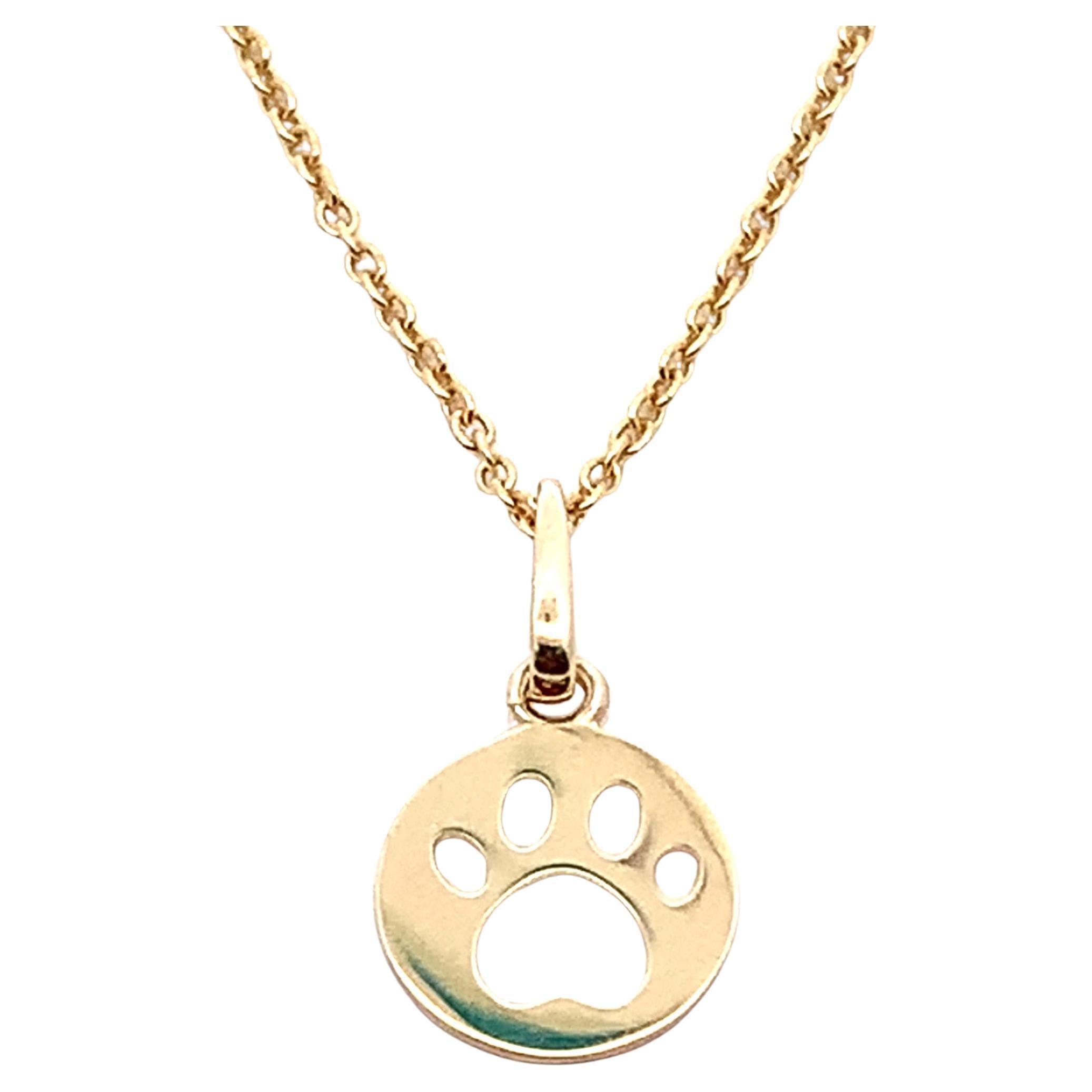 Dog paw pendant necklace yellow gold
