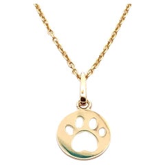 Dog paw pendant necklace yellow gold
