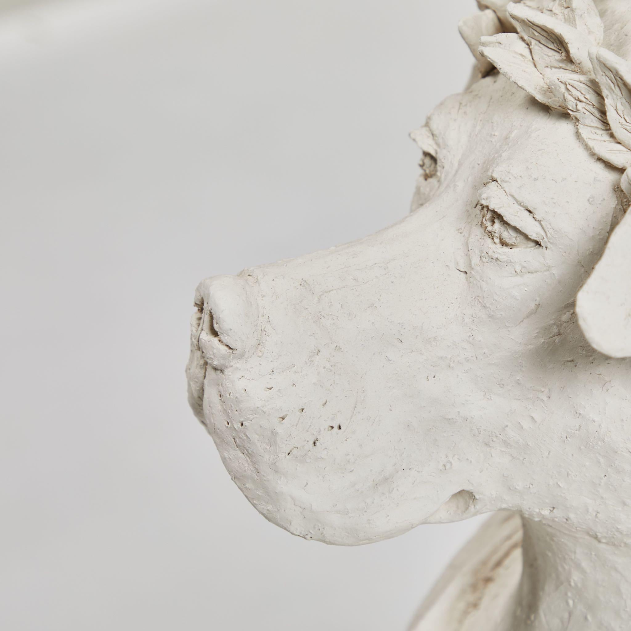 plaster dog statue