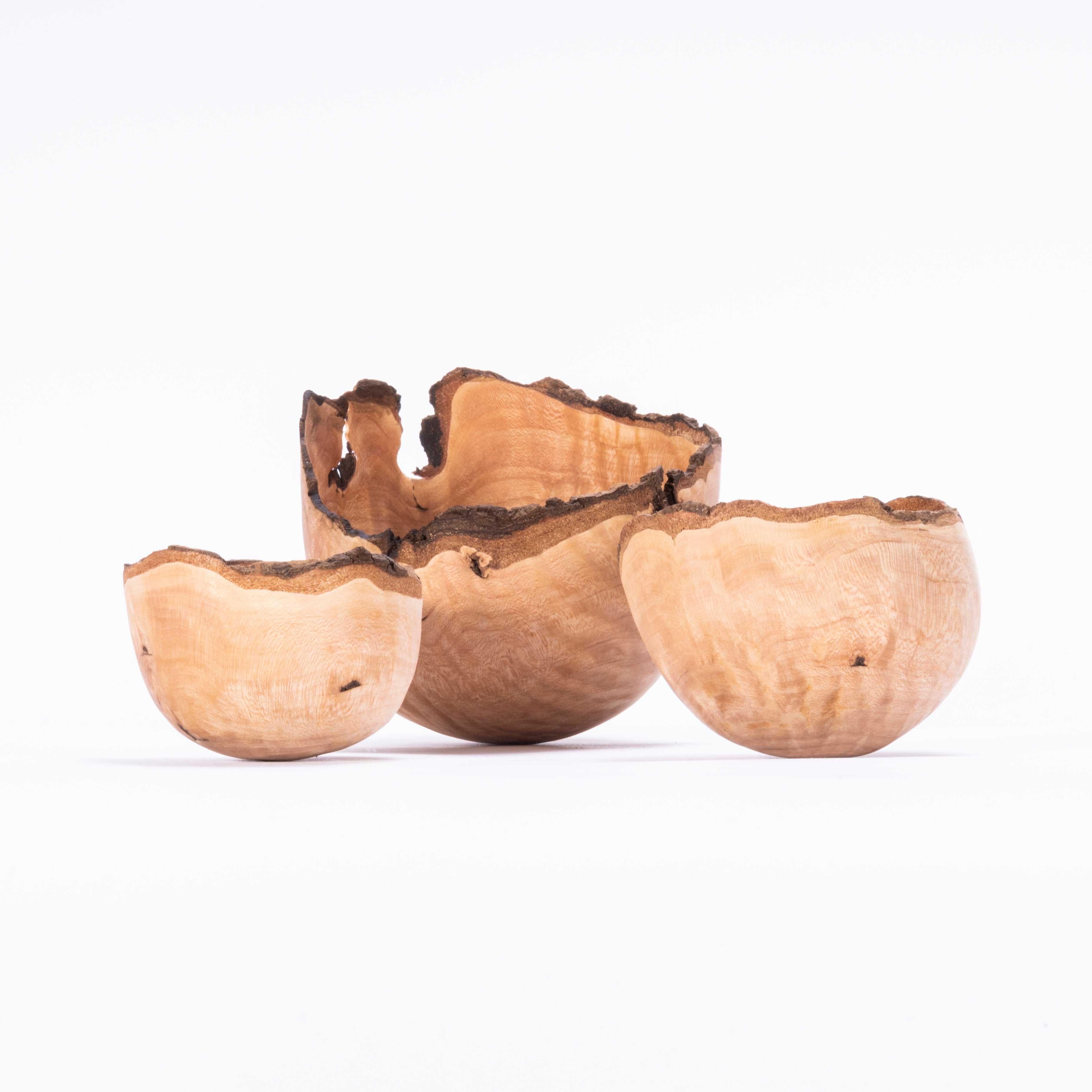 Dog Wood Hand Turned Bowl - Tyler & Tara - Set Of Three. 

Tyler and Tara are our friends in Knoxville Tennessee, they are contemporary wood turners, sourcing wood locally and hand selecting each piece for turning. This is a unique set made for us,