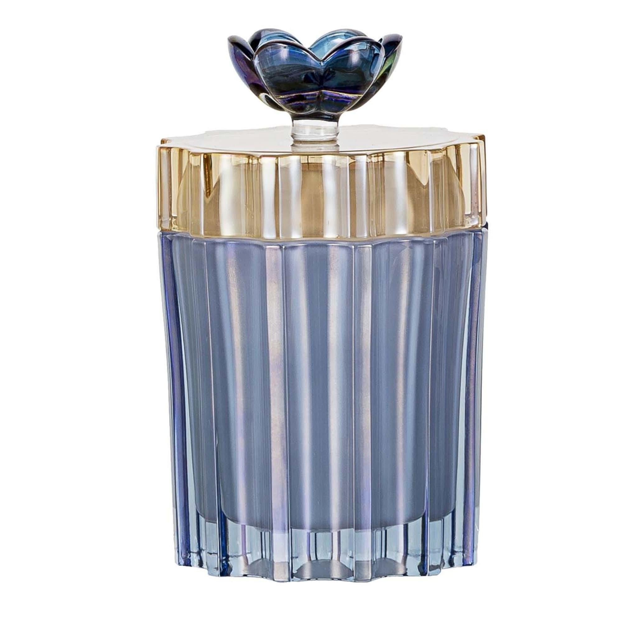 This elegant crystal glass box will be a superb addition to a vanity table in a bedroom or powder room. Its geometric, traditional silhouette is marked by a handmade decoration of etched vertical patterns enhancing the light blue hue of the piece