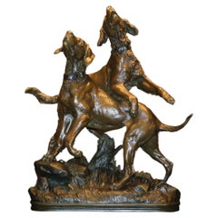 "Estatua de metal patinado "Perros