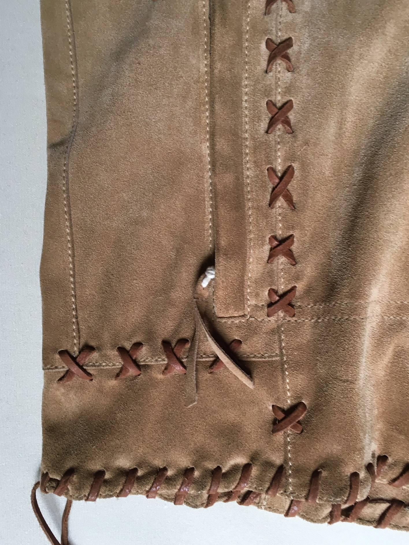 A Dolce & Gabbana Buffalo Tribe calf suede leather jacket ,with many top stitching details for an iconic Western chic  and vintage look.
Size marked 52 (italian/european) equal to 42 (large) USA.
Unworn, Never Used 