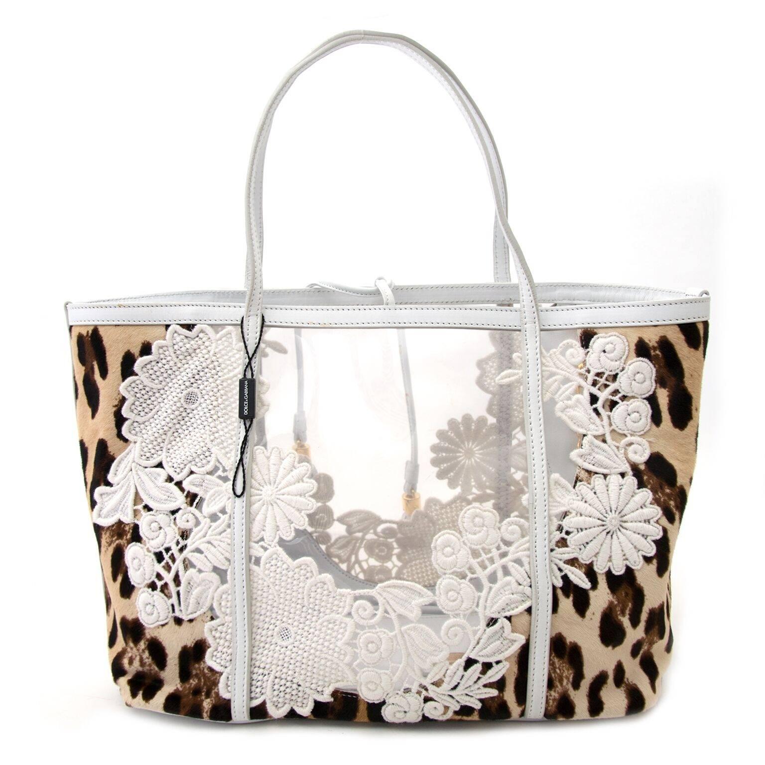 Good preloved condition

Dolce & Gabbana Escape Leopard Print

Trend Alert ; Plastic see-through , seen at Chanel, Delvaux and D&G runway. 
This stunning tote by Dolce and Gabanna is finished with leopard ponyhair and white lace.
The inside offers