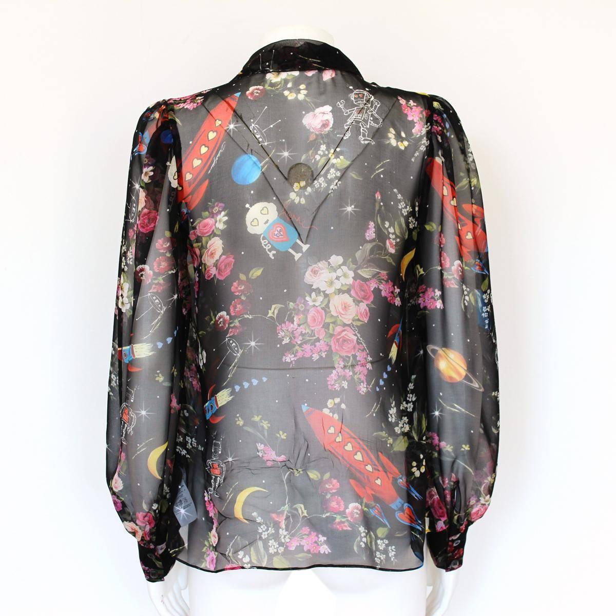 Beautiful and very wanted Dolce & Gabbana shirt
Silk
Black color
Multicolored fancy pattern, floral & stellar falres
Central buttons
Lenght from shoulder cm 57 (22.4 inches)
Made in Italy
Worldwide express shipping included in the price !