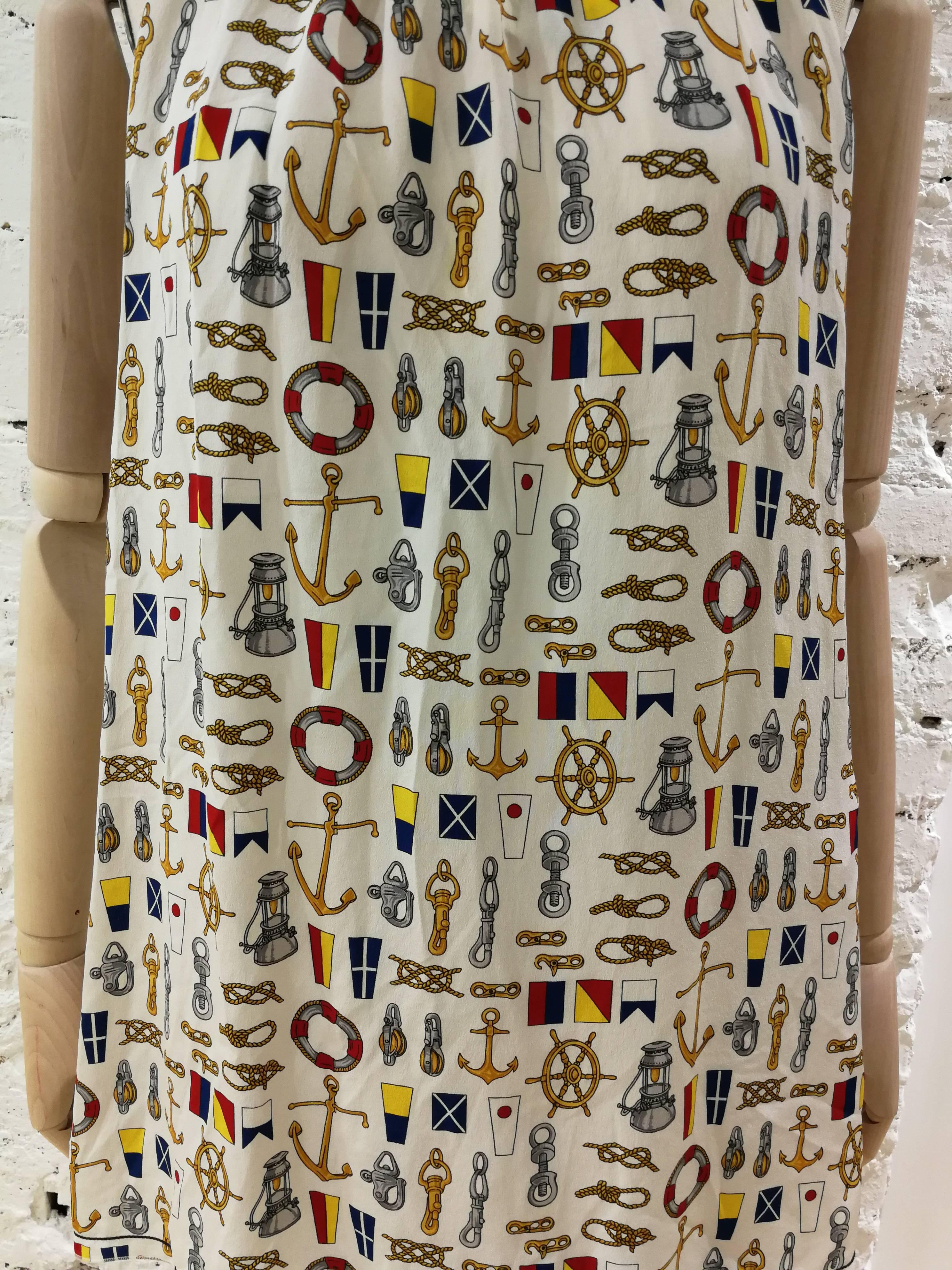 Dolce & Gabbana dress

The silk print features seafaring symbols and flags.

Made in Italy, size 44 