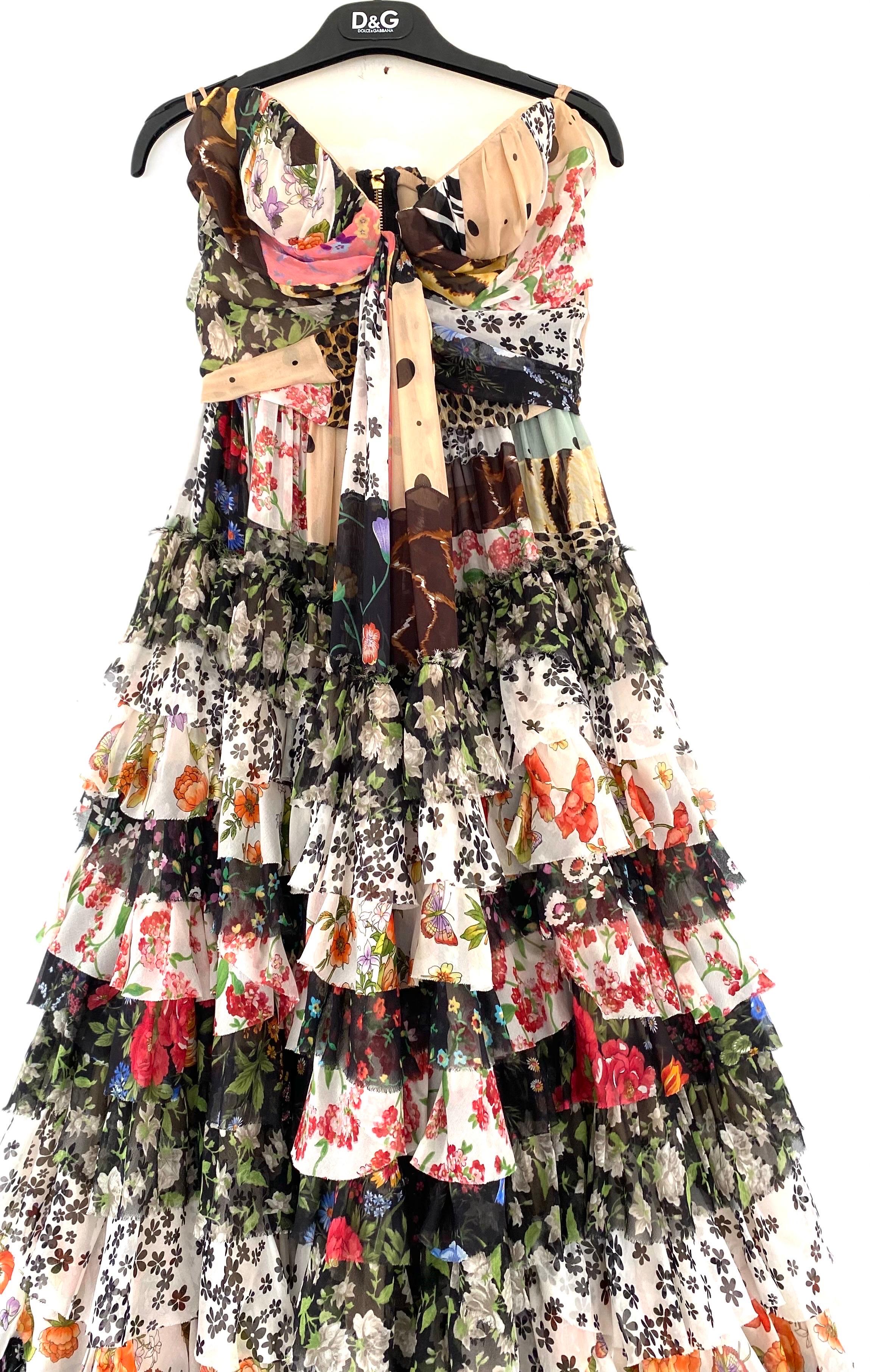 Incredible 1990s D and G by Dolce and Gabbana maxi dress from the spring 2008 RTW runway
Corset gown has a tiered skirt with a massive sweep 
Layers of multi color chiffon are backed with pale taupe silk 
100% silk
Boned bodice and built in interior