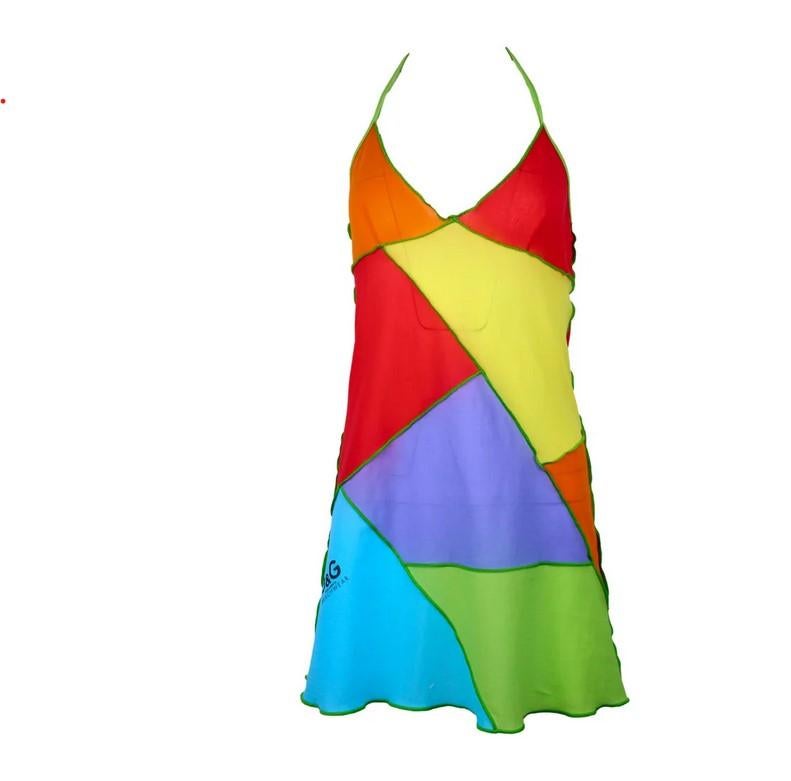 Dolce and Gabbana 2003 D&G Patchwork Multicolor Mesh Transparent LGBTQ Mini Beachwear Dress Cover-up
Vintage D&G beachwear semi-sheer halter dress features beautiful different color squares through-out, ties at the neck, low back. Made in
