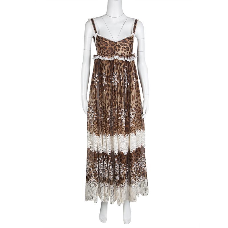 Create the most stunning feminine and minimally glamorous looks at those parties and events wearing this gorgeous Dolce and Gabbana maxi dress. Constructed in leopard printed silk fabric, this dress is accented with cream coloured cotton blended