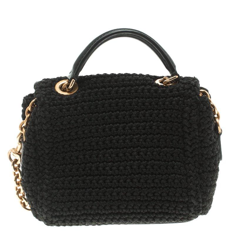 Every feature on this Dolce & Gabbana crossbody bag is awe-inspiring which makes the creation worthy of being owned. It has been crafted from tweed in a crochet design and styled with a flap that reveals a fabric interior. The bag has a top handle,