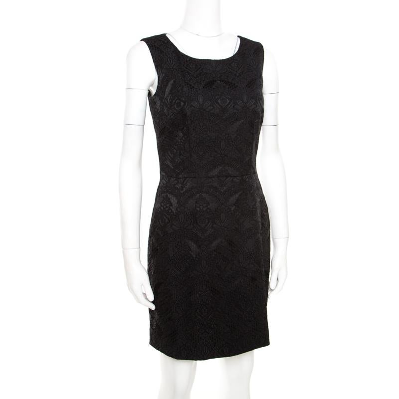 Make room in your closet for this piece from the house of Dolce & Gabbana. It is covered in floral embroidered jacquard and tailored to offer a great shape. Wear this black dress with pumps or ankle strap sandals for a look of elegance.

Includes: