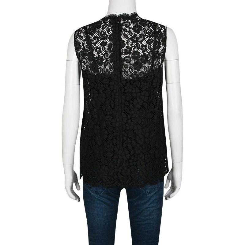 Classic black separates make for the perfect outfit when you're heading out for an evening adventure. Designed by Dolce and Gabbana in a cotton blend, this sleeveless top adorned with a beautiful lace overlay makes a statement when paired with