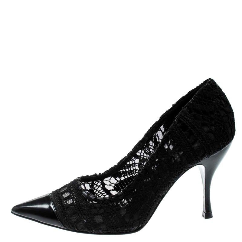 Feel beautiful and be comfortable while flaunting these black pumps from the house of Dolce & Gabbana. They have been designed using lace in a crochet style and tipped with leather cap toes. Their 9.5 cm heels will lift you always.

Includes: The