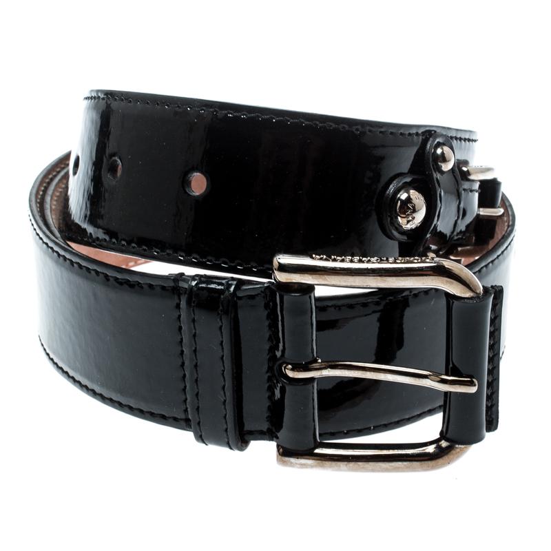 Light up your belt collection by adding this belt from Dolce and Gabbana. It has been crafted from patent leather and detailed with a gold-tone buckle. This black belt is durable and worthy of a place in your closet.

Includes: The Luxury Closet