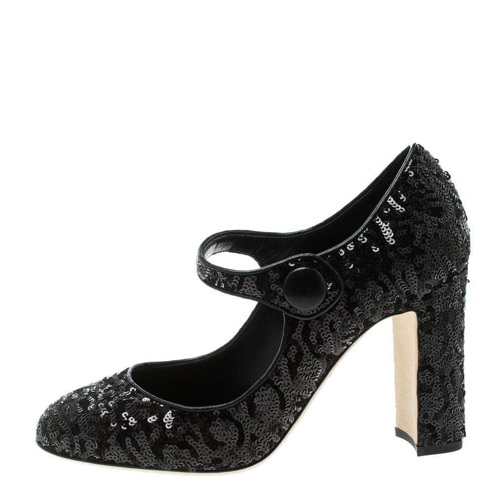 You can confidently wear this Dolce and Gabbana pumps for longs nights- thanks to the comforting block heel that it rests on. The feature the classic Mary Jane silhouette with a black sequin body and secured with a gunmetal-tone tab closure. Style