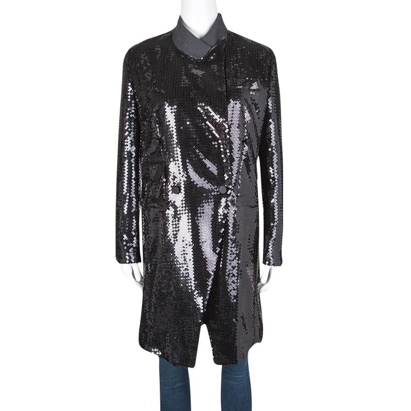 Elevate your wardrobe value with this coat from Dolce&Gabbana. This black coat has been wonderfully tailored from quality fabrics and designed with sequins, velvet trims, and a double-breasted style. This creation is well-made and is just perfect to