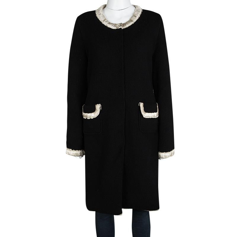 You'll surely love owning this black coat from Dolce&Gabbana because it has been wonderfully crafted from wool to keep you warm. The long coat comes with long sleeves, front pockets and silk trims.

Includes: The Luxury Closet Packaging

