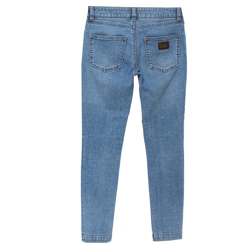These Dolce and Gabbana denim Kate jeans are perfect for daily wear. Crafted from a blend of cotton and elastane, the blue jeans feature a concealed zip fastening, belt loops at the waist, five pockets, and a Dolce and Gabbana plaque on its back