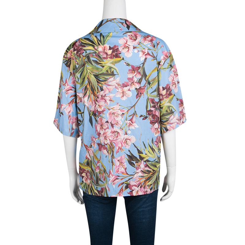 This Dolce And Gabbana shirt with its engaging patterns and compelling use of colours is apt for a scintillating look. Utilizing a cotton blend and on-trend designs, this shirt is an impeccable addition to your evening wear collection. On your