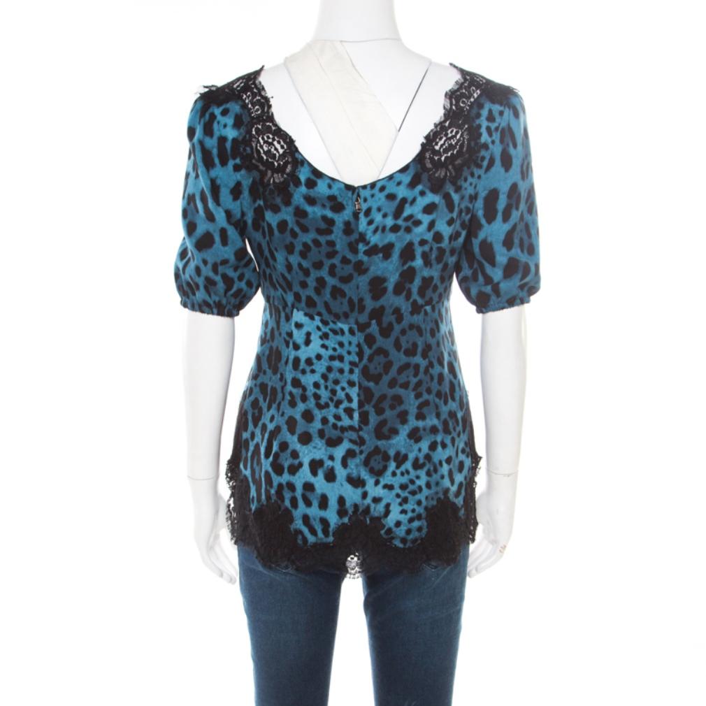 A blend of comfort and style, this Dolce & Gabbana blouse is exactly what you'd expect. Made from blended fabric, this piece lets you embrace the inner fashionista in you. It comes in leopard prints, short sleeves and lace inserts.

Includes: The