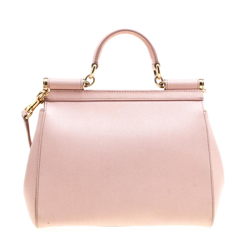 Whether it is a casual evening or a night out with your friends, Miss Sicily bag is a splendid pick for any occasion. This blush pink bag beautifully embodies the spirit of extravagance and feminity that the Italian luxury brand carries. From the