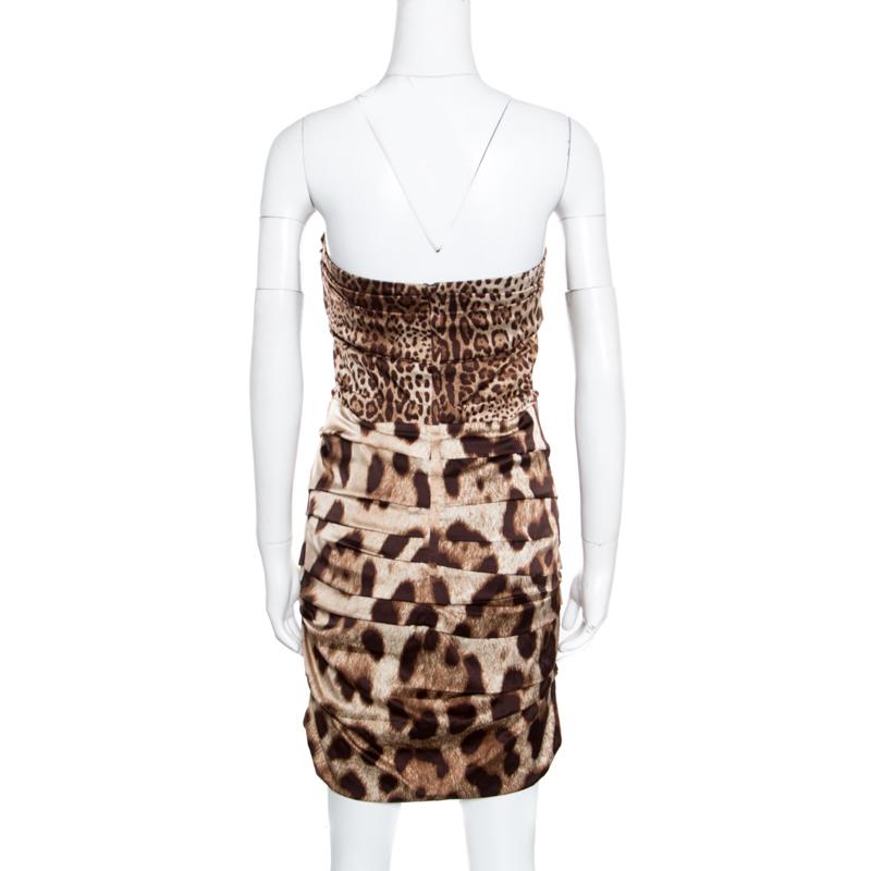 Make a stunning style statement with this gorgeous and bold dress from the house of Dolce And Gabbana which comes adorned with animal print all over. Appear in great style dressed in this alluring brown shade. A party night calls for a blended