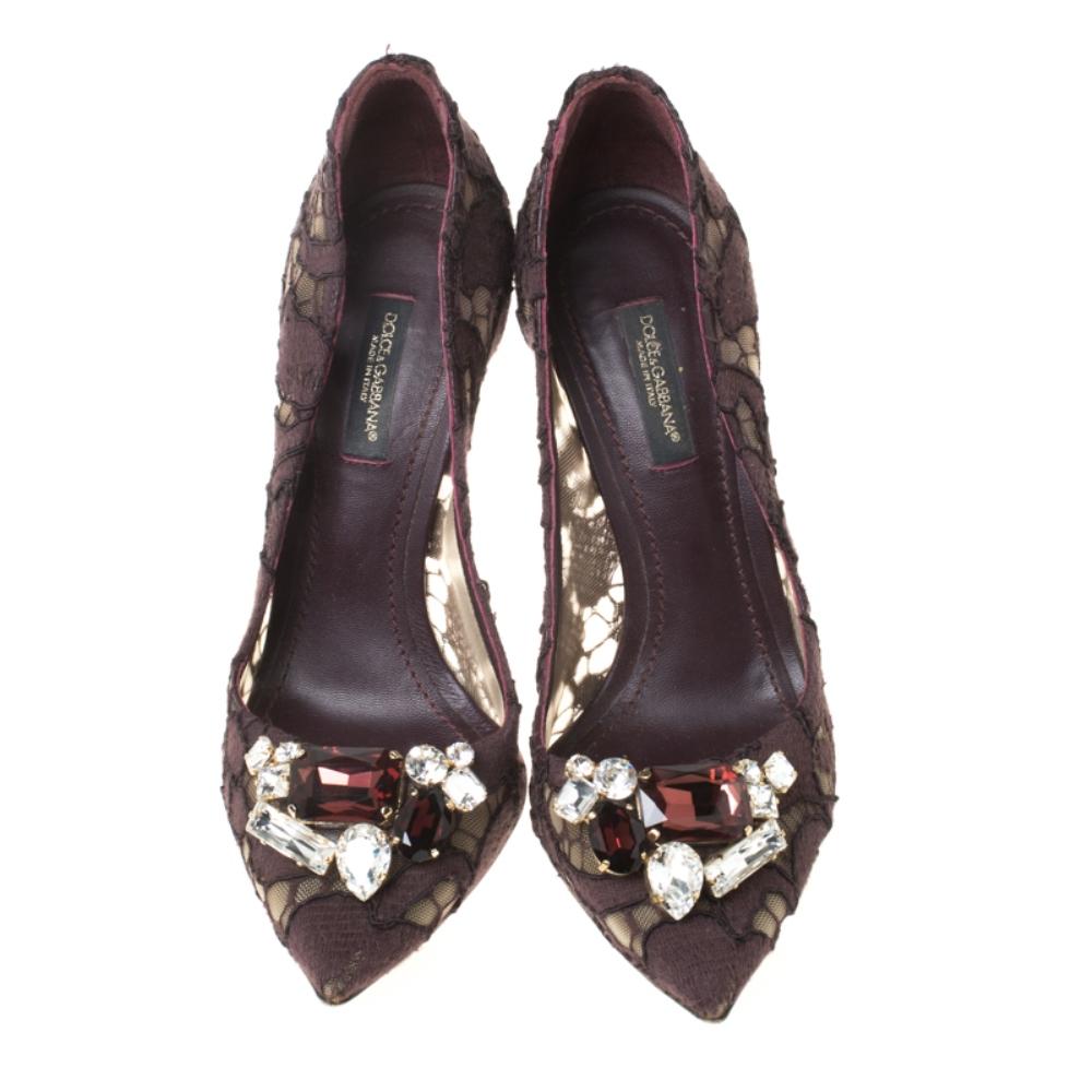 Lend your style game an instant boost with these stunning Dolce and Gabbana pointed-toe pumps. Look your classy best wearing these crystal embellished lace pumps in brown colour; perfect for a special evening out.

Includes: Original Dustbag


