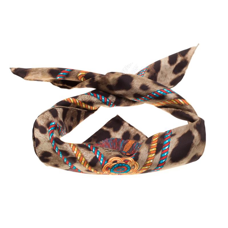 Complete your ensembles with a touch of luxury using this scarf from Dolce & Gabbana! Designed in prints of tassels over leopard and finished with hemmed edges, the silk scarf simply delights. It will surely make one stylish accessory in your