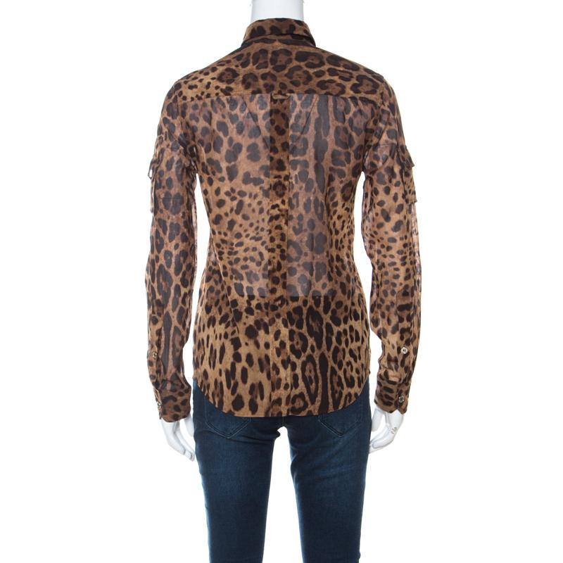 You will definitely not go unnoticed when you step out wearing this shirt from Dolce & Gabbana. The shirt is made of a cotton and silk blend and features a leopard print all over it. It flaunts front button fastenings, long sleeves and pockets.