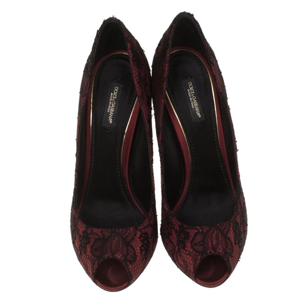There's nothing that speaks elegance better than lace and that's why these burgundy pumps by Dolce and Gabbana are a dream worth owning. Beautifully designed with satin and lace, these pumps flaunt peep toes, stiletto heels, and leather insoles.