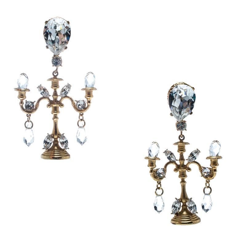 Dolce and Gabbana never fails to startle us with their unique designs, and these amazing earrings do the same. Amazingly sculpted in the shape of a chandelier from gold-tone metal, these earrings are beautifully decked with crystal embellishments