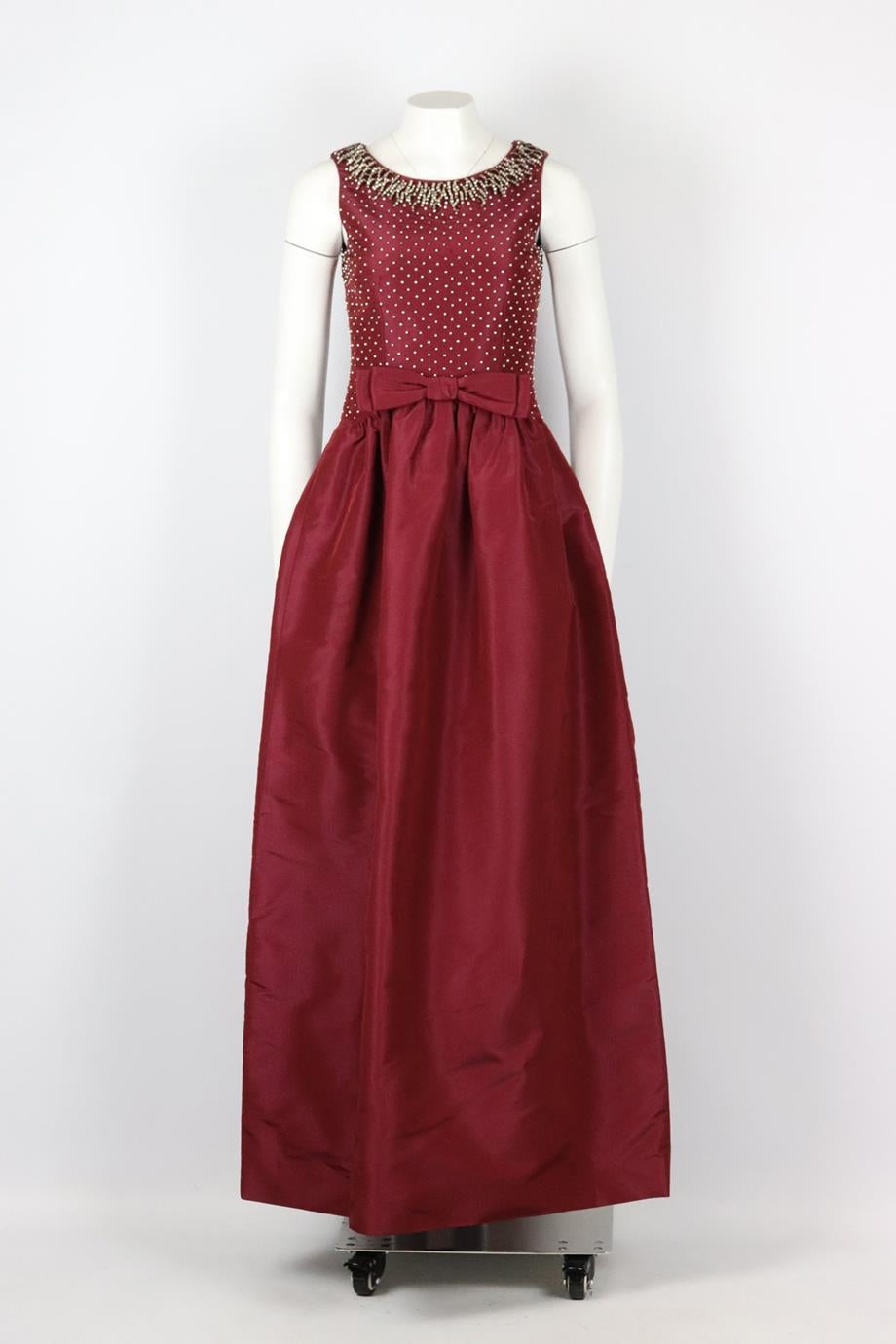 Dolce & Gabbana crystal embellished silk faille gown. Burgundy. Sleeveless, crewneck. Zip fastening at back. 70% silk, 20% glass, 10% polyester; lining: 100% silk. Size: IT 40 (UK 8, US 4, FR 36). Bust: 32.5 in. Waist: 29.8 in. Hips: 38.2 in.