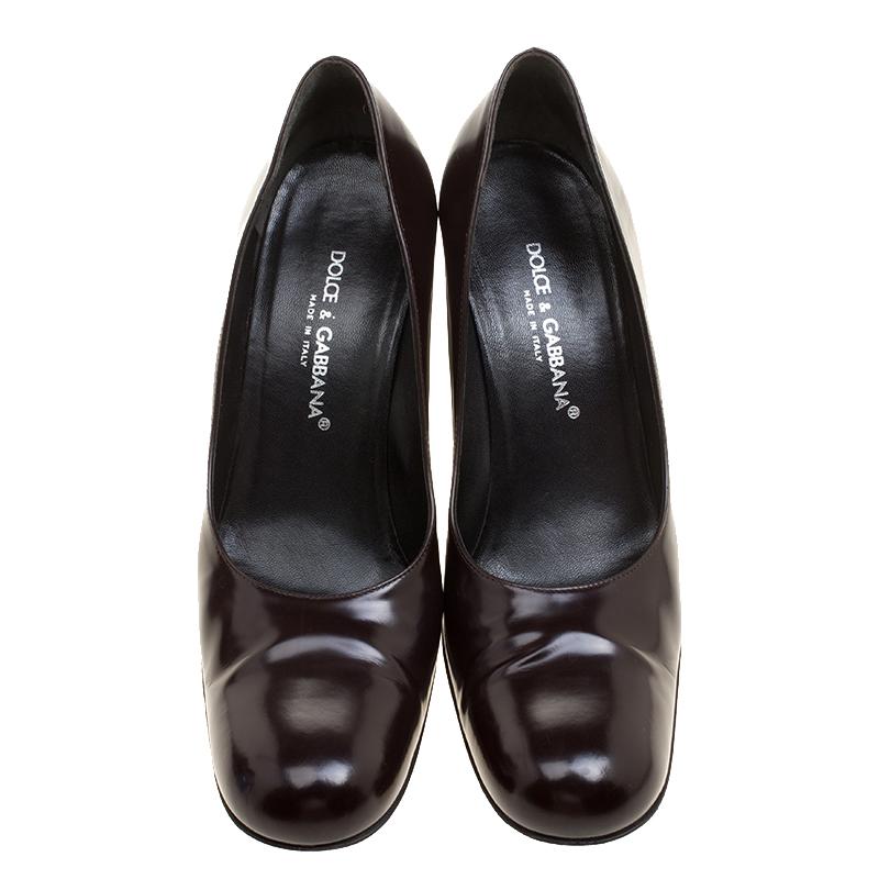 These pumps from Dolce&Gabbana are just the right pair to wear to work or with your formal wear. They are crafted from leather and styled with round toes, comfortable insoles and 9 cm block heels.

Includes: The Luxury Closet Packaging

