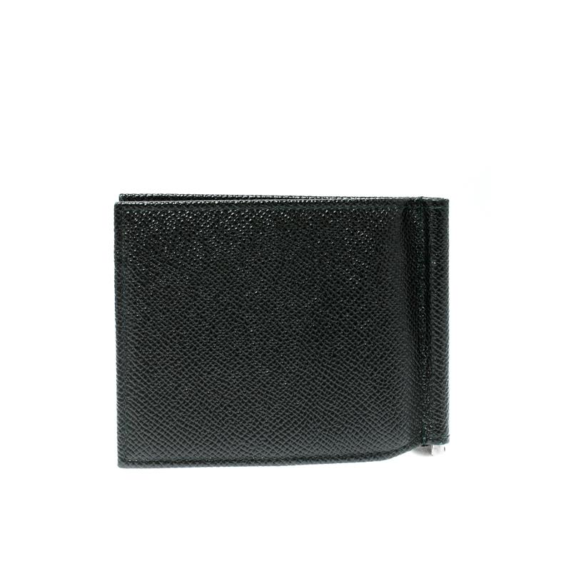 Creations by Dolce&Gabbana are worth the buy! This leather card holder comes in a bifold style and it houses a money clip and slip slots to carry your important credit, debit cards or ID cards easily. Lightweight, this cardholder is simple and